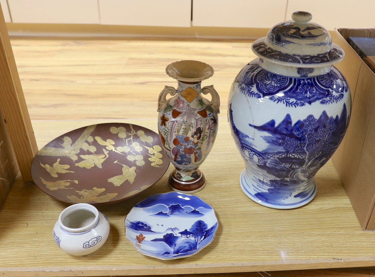 A large Chinese blue and white baluster jar and cover (a.f.) and four other Oriental items. Tallest 45cm